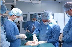 performing breast augmentation surgery